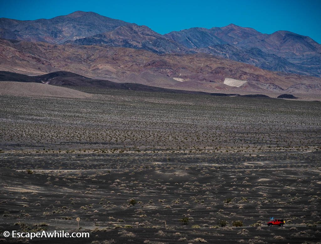 One of the bright red hire Jeeps turning off to the 25 mile 4WD-only track to Racecourse, Death Valley NP.