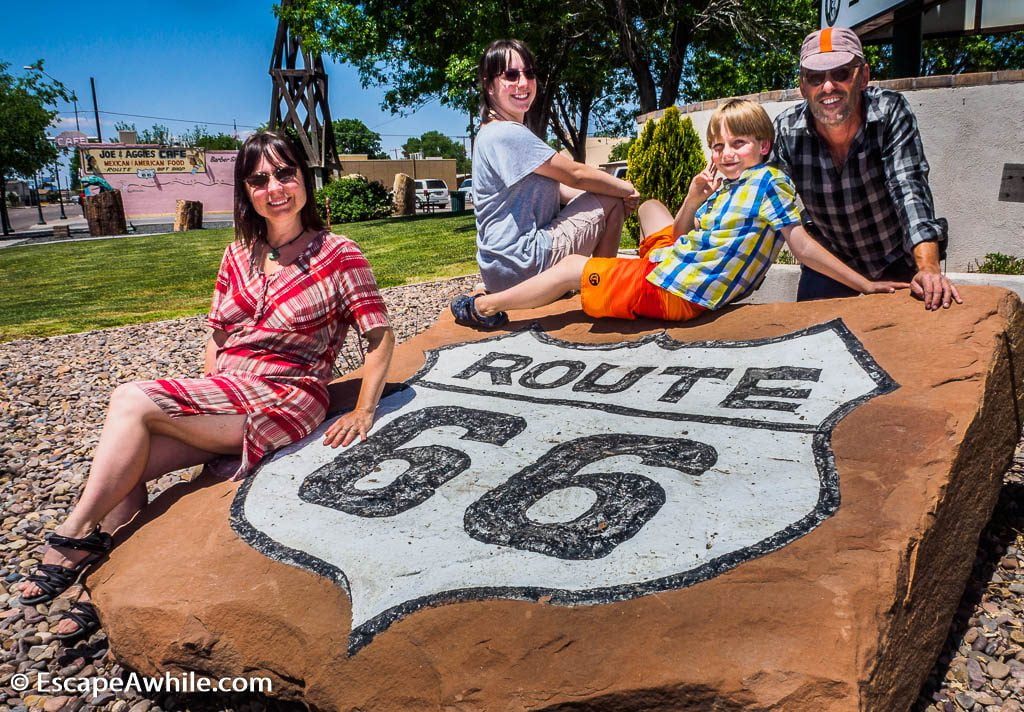 Family photo on historic Route 66 marker, Holbrook, Arizona, USA